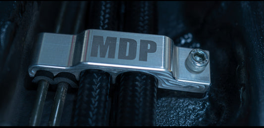 Soporte de línea de combustible y freno MDP